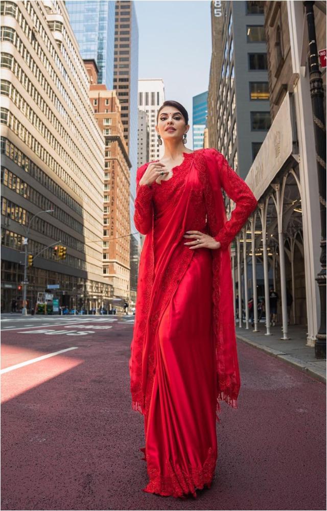 Jacqueline looked stunning in a bright red embroidered saree for the occasion