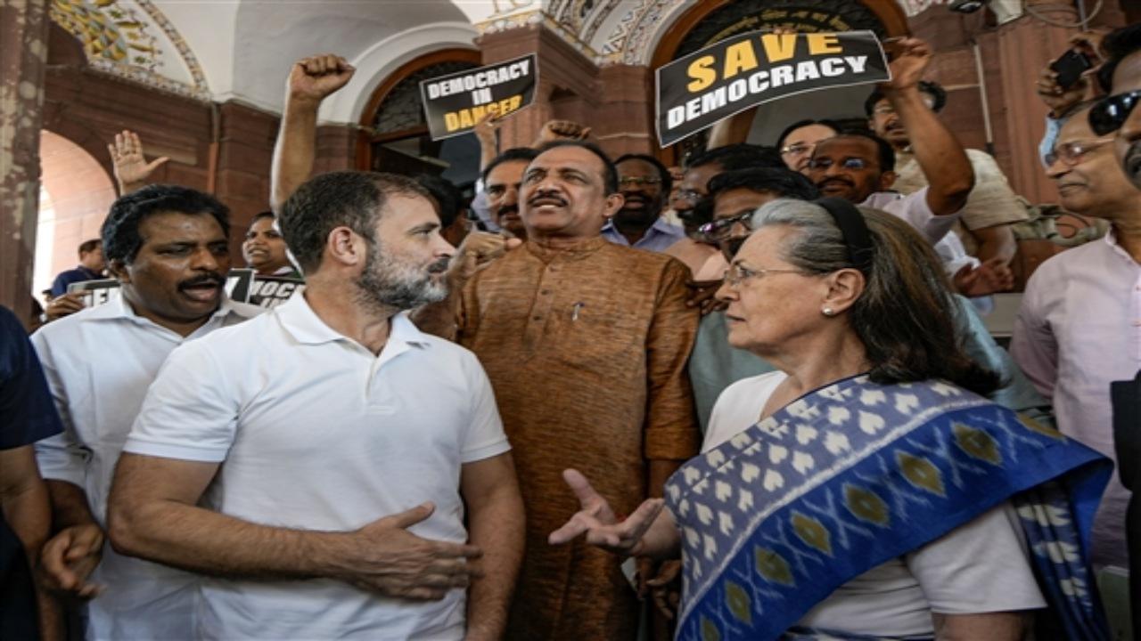 Holding placards reading, Democracy in Danger', Save Democracy', the protesting members gathered at Parliament premises and raised slogans to demand the revocation of the suspension of Adhir Ranjan Chowdhury.