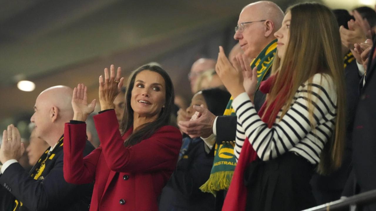 Queen Letizia of Spain, left, applauds as she attends the Women’s World Cup soccer final between Spain and England with her daughter Princess Infanta Sofia, right, at Stadium Australia in Sydney, Australia, Sunday, Aug. 20, 2023. (AP Photo/Mark Baker)