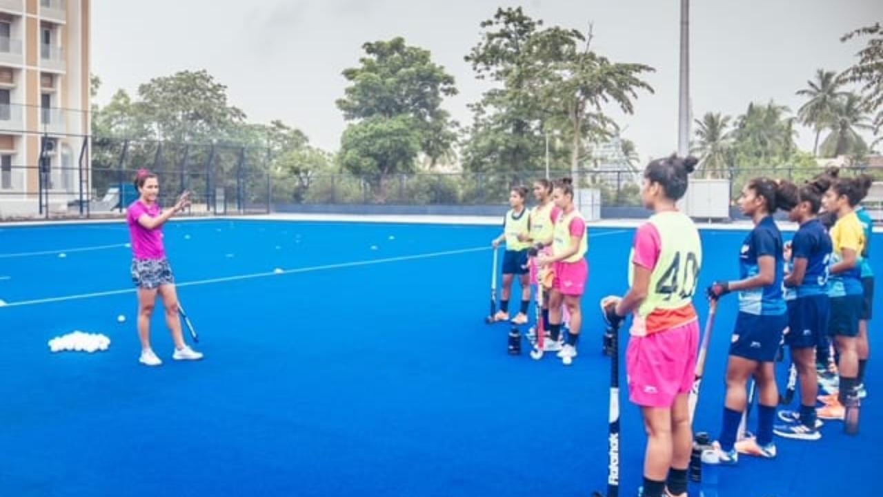 Former India hockey captain Rani Rampal interacts with young players during a camp for strikers in Bhubaneswar recently