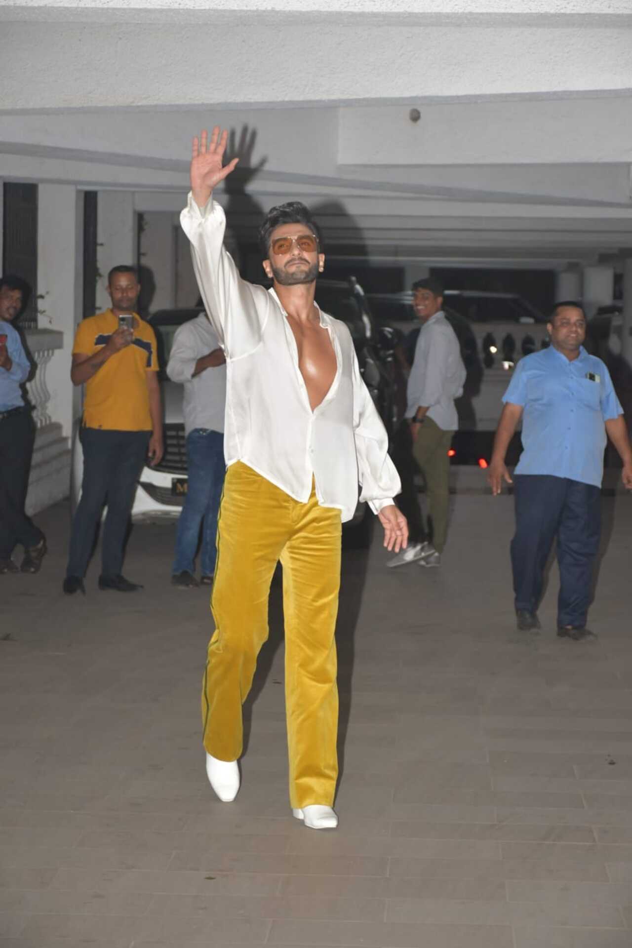Ranveer Singh was at his energetic best as he greeted the paparazzi. The actor was dressed in bright yellow pants and white silk shirt