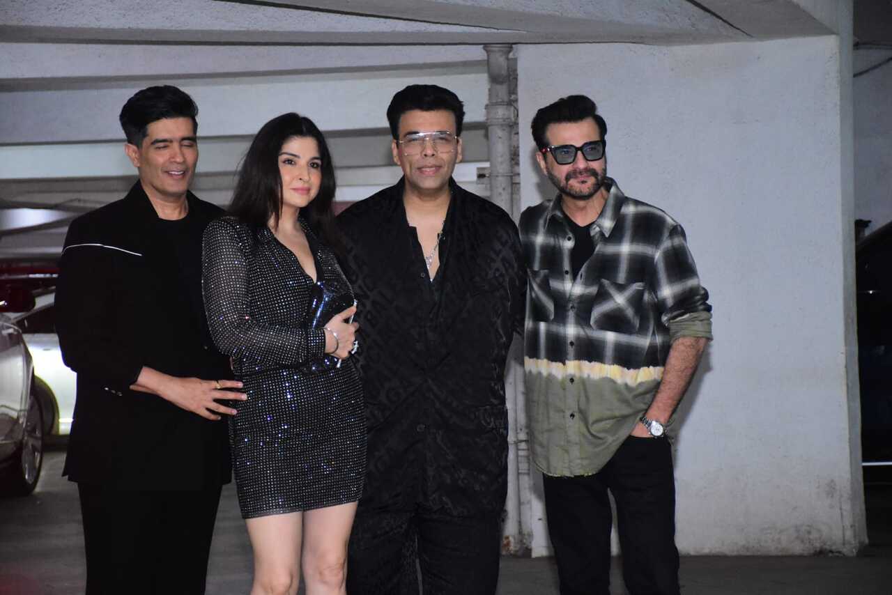 Manish Malhotra and Karan Johar pose with Maheep and Sanjay Kapoor