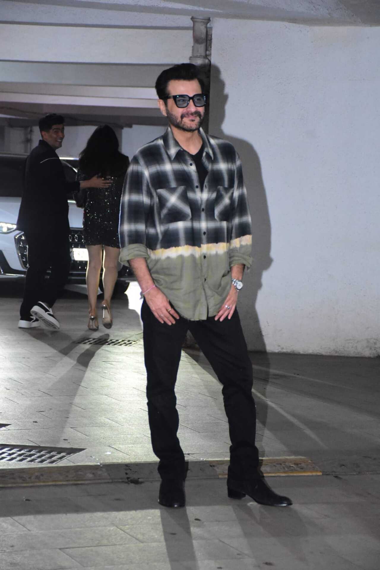 Sanjay Kapoor looked cool in a check shirt and black denims for the party. The actor was recently seen in the show 'Made In Heaven'