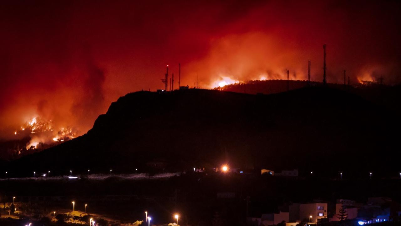 Wildfire rages in a forested area on the Canary island of Tenerife. Pics/AFP