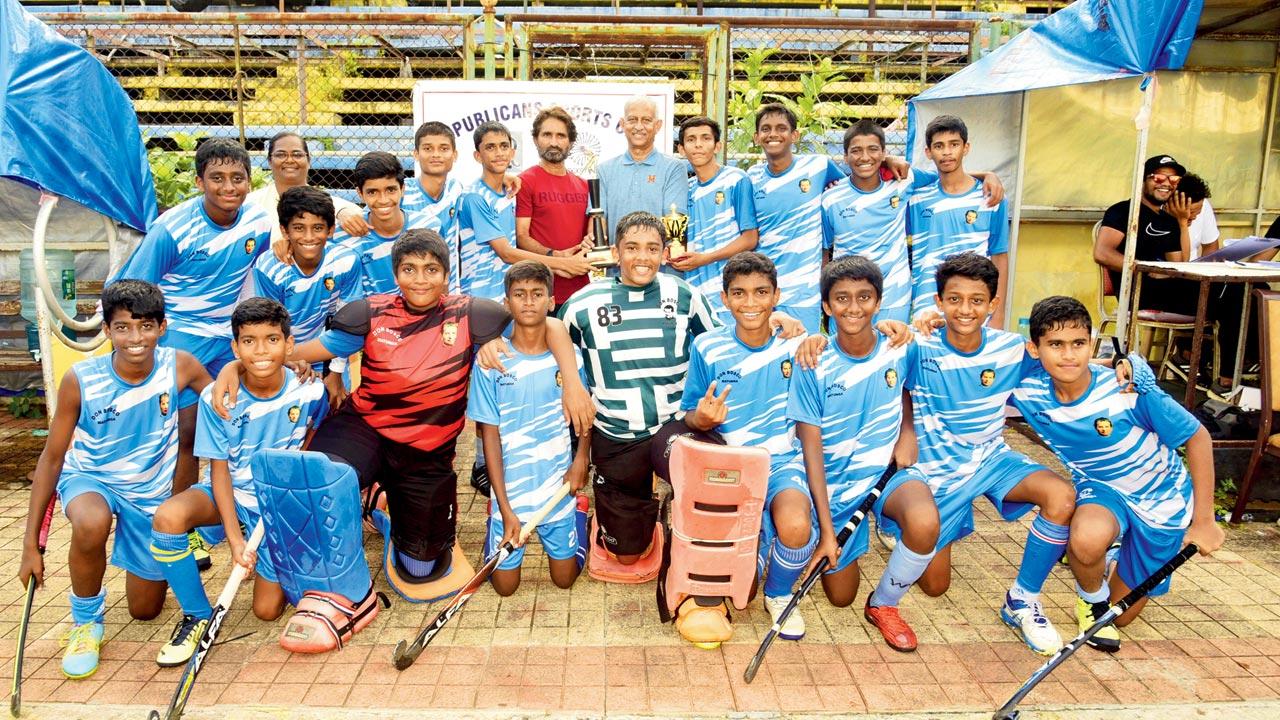 The Don Bosco boys with their trophy yesterday