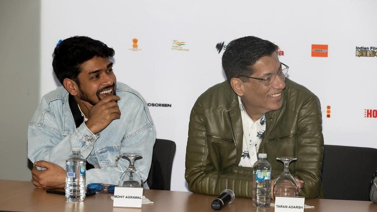 Trade analyst Taran Adarsh caught in a candid moment at the IFFM inauguration panel