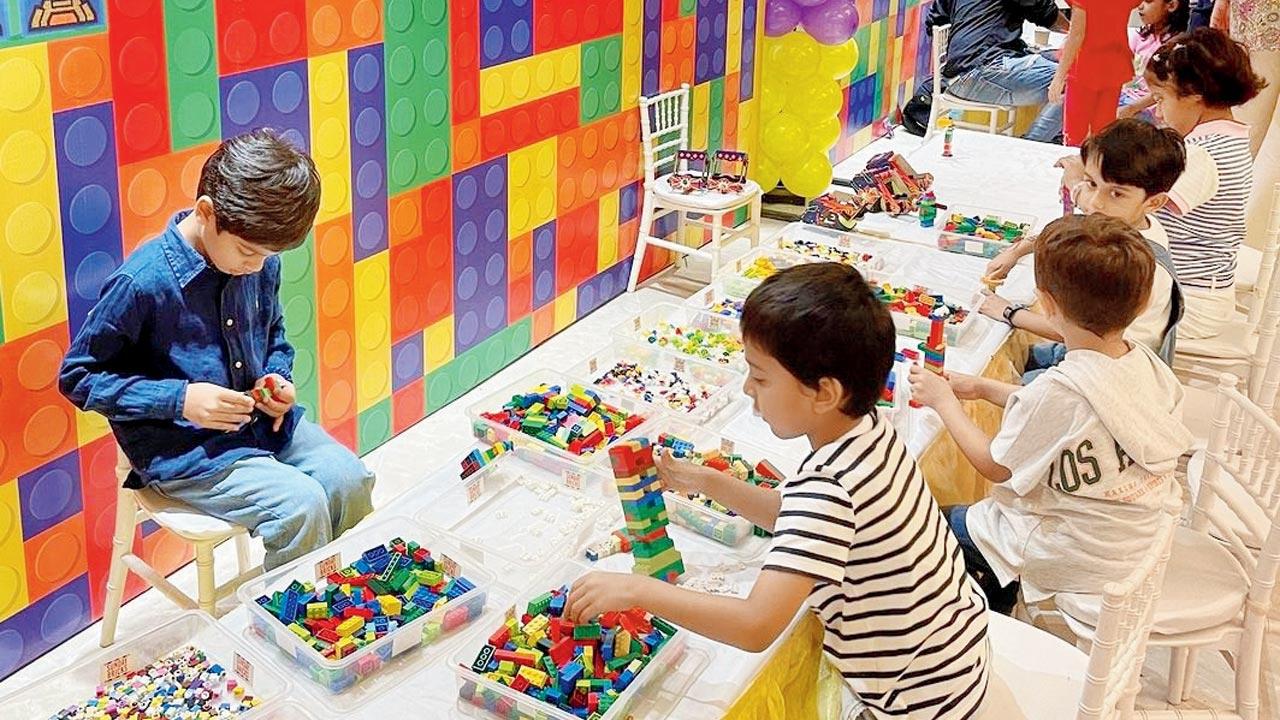 Children try creating LEGO models. Pics Courtesy/Instagram