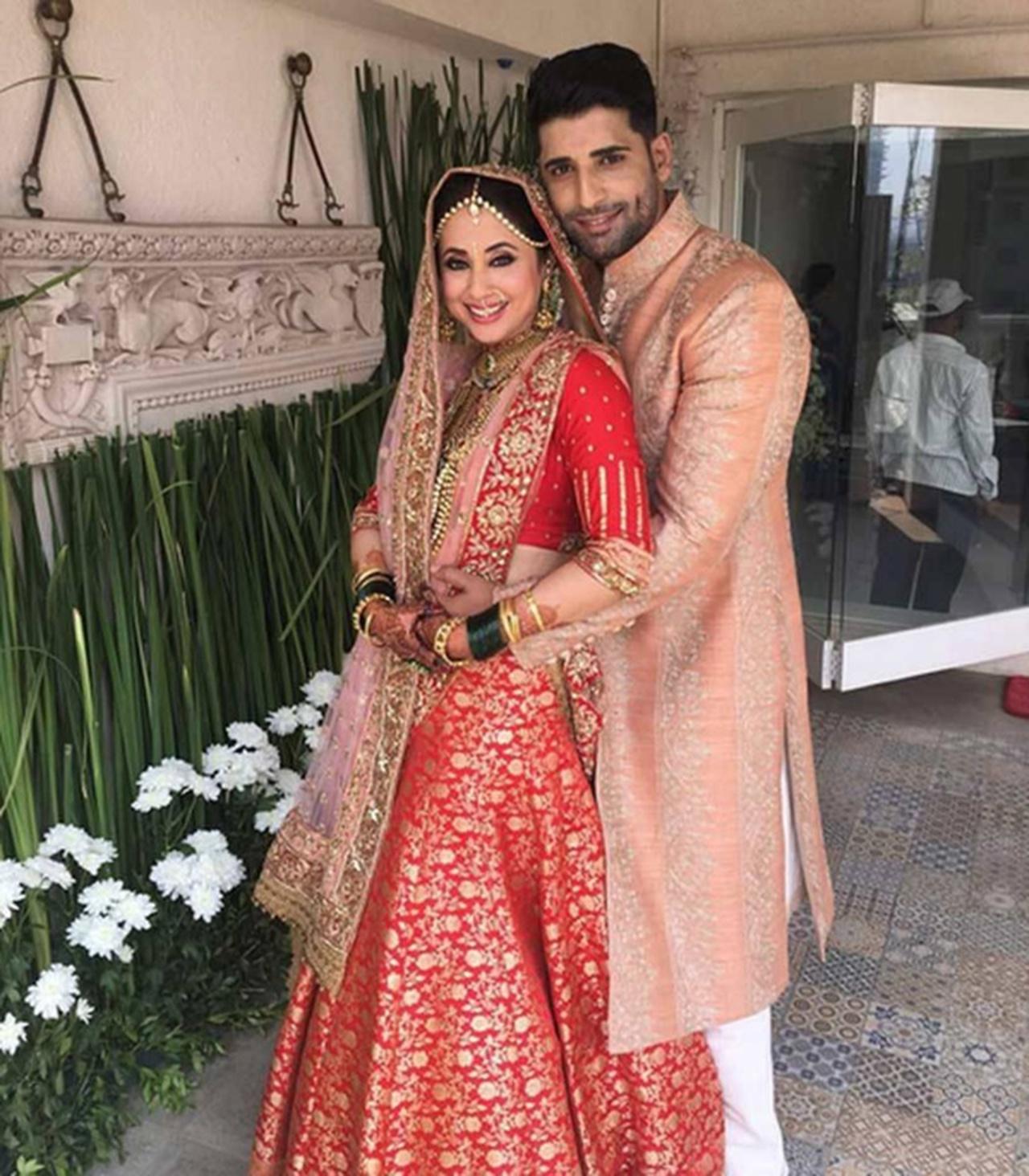 Urmila Matondkar
Kiara Advani was not the only bride who was decked up in Manish Malhotra. Urmila Matondar also chose the luxury designer's bridal couture for her low-key wedding. She wore a red and gold silk lehenga with roses embroidered on the hem