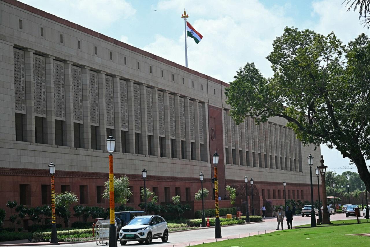 Around the same time, two others sprayed coloured smoke from canisters while shouting slogans outside the Parliament premises