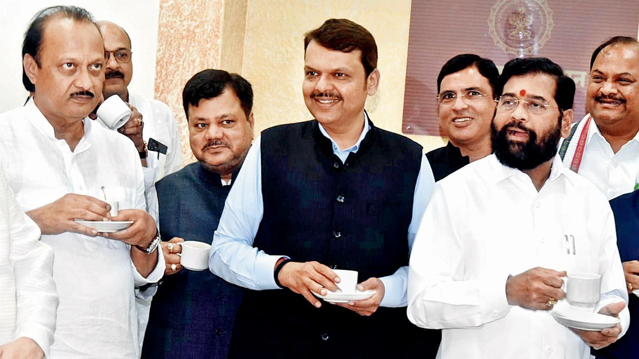 Chief Minister Eknath Shinde (right) with deputy CMs NCP’s Ajit Pawar (left) and BJP’s Devendra Fadnavis (centre)