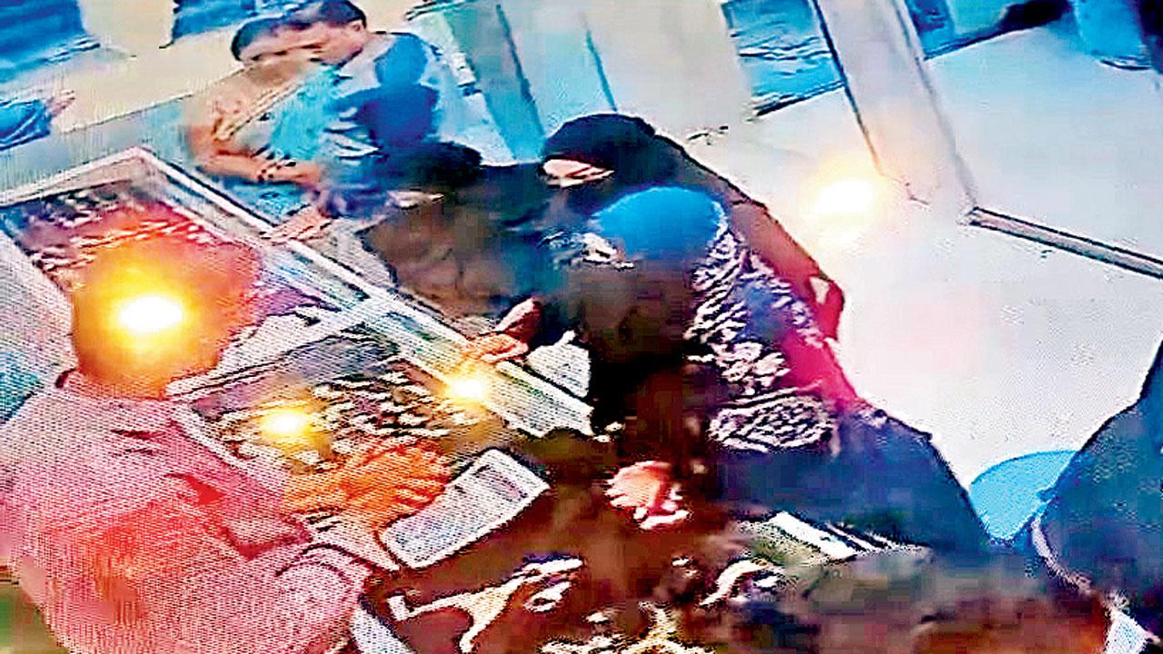CCTV footage of the accused inside the jewellery store at Malwani in Malad on November 22