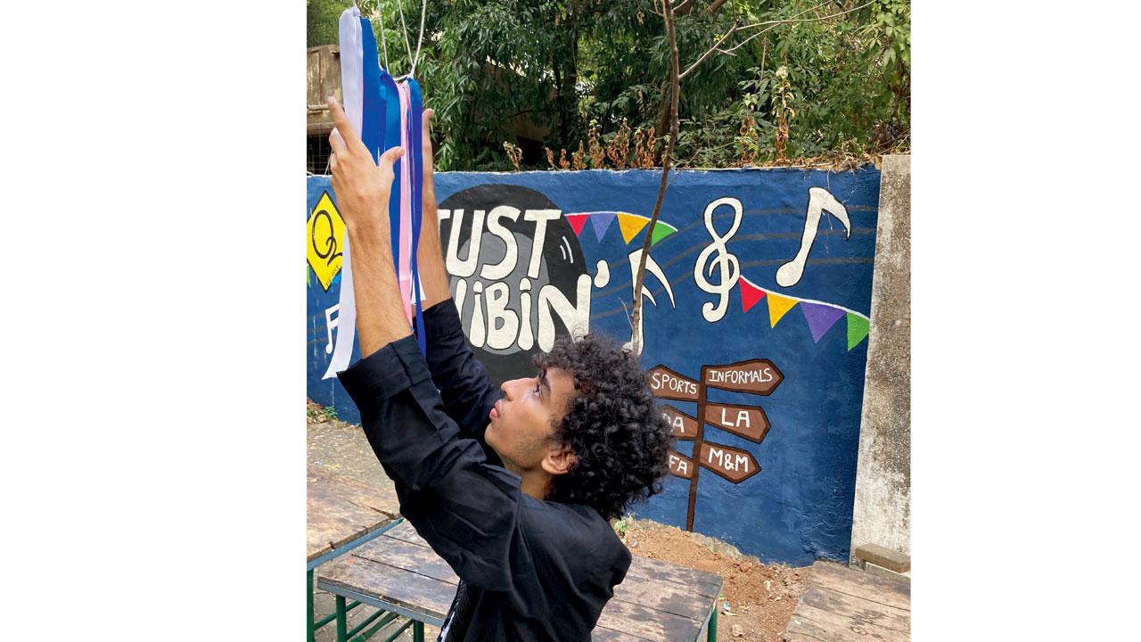 A student sets up the space for the fest