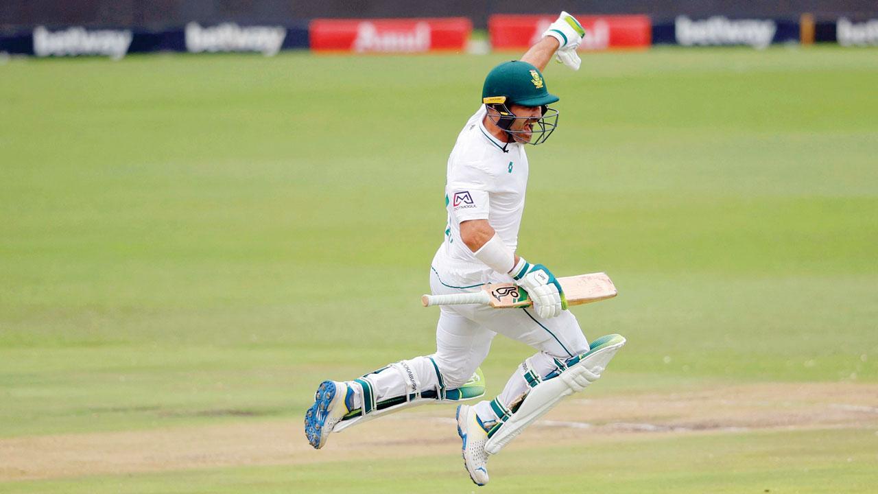 South Africa’s Dean Elgar celebrates his century against India at SuperSport Park yesterday. Pic/AFP