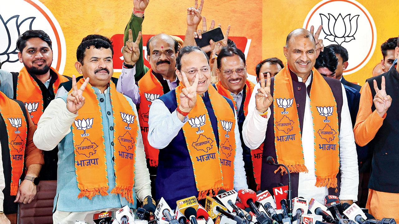 Rajasthan BJP incharge Arun Singh and State BJP President CP Joshi at a press conference. Pic/PTI