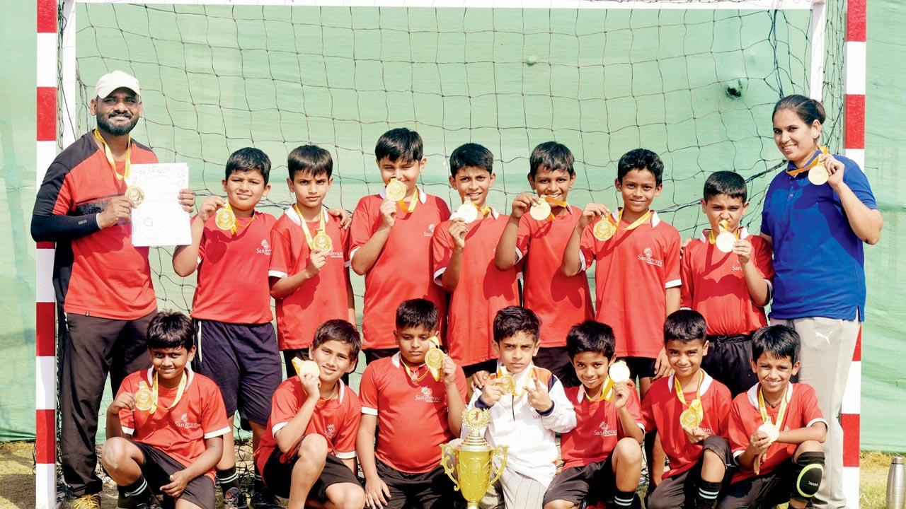 Sanjeevani World School with the boys U-10 handball winner’s trophy  at Azad Maidan on Wednesday. Pics/Atul Kamble