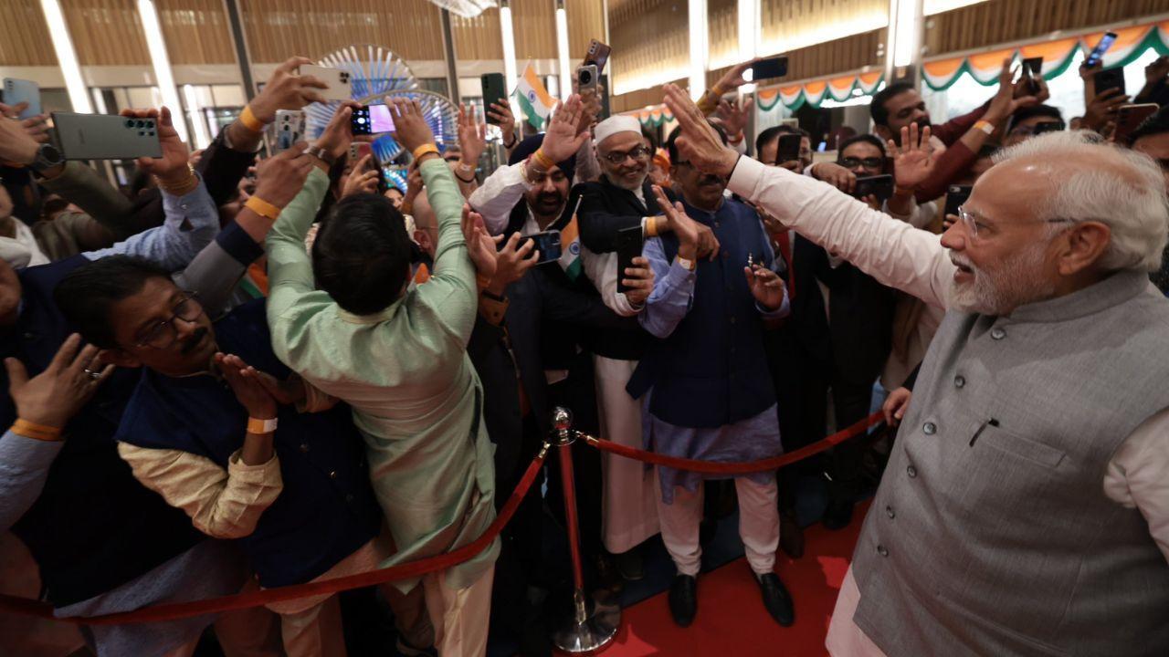 Prime Minister Narendra Modi was greeted with a grand reception by the Indian diaspora upon his arrival in the UAE. The enthusiastic crowd expressed their excitement with loud cheers, and chants of 'Modi, Modi.'