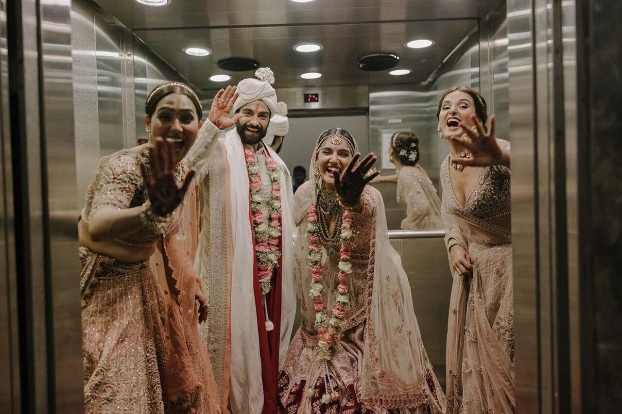 New bride Mukti shared this picture, which shows Kunal and Mukti striking a fun pose with the latter's sisters Neeti and Shakti, taken inside an elevator 