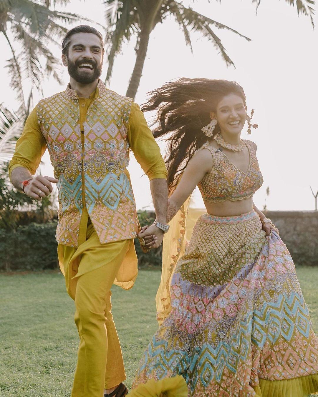 In this picture from the couple's mehendi ceremony, Mukti and Kunal were seen posing candidly for the camera as they enjoyed the special moment