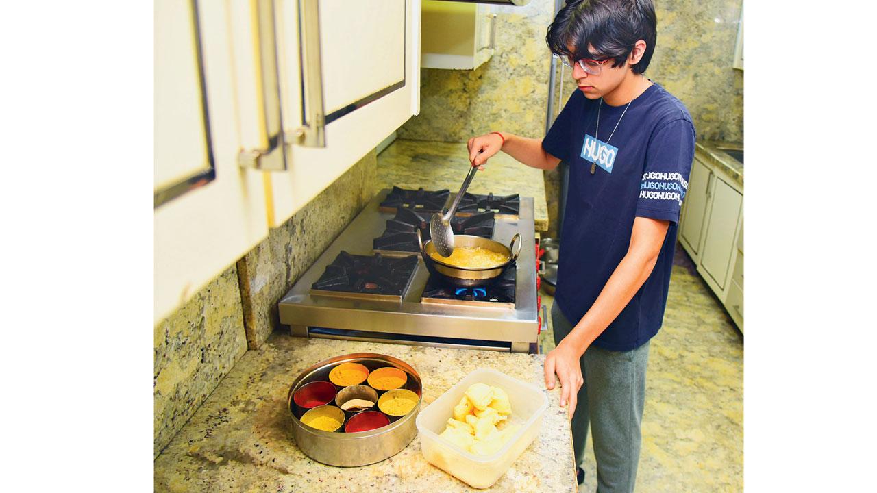 Home chef Om Hemdev, just 16 years old, adds a pan-Asian piquancy to alu tuk, making it more relatable to youngsters. Pic/Shadab Khan