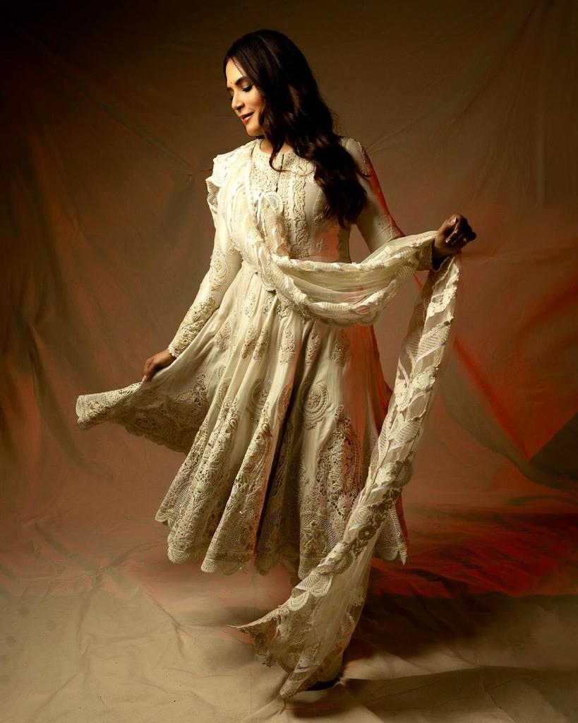 Want something regal and beautiful but also chic? This pearl white embroidered anarkali suit is a great pick
