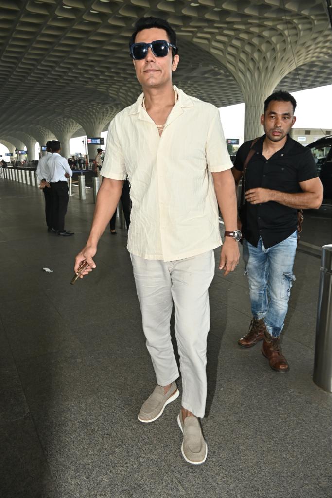 Newlywed Randeep Hooda was spotted at the airport in an all-white outfit