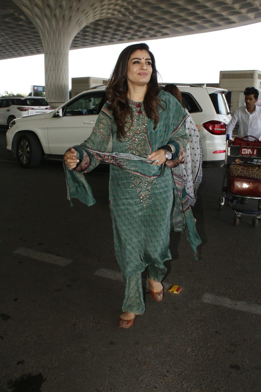Raveena Tandon opted for a green suit for her airport look
