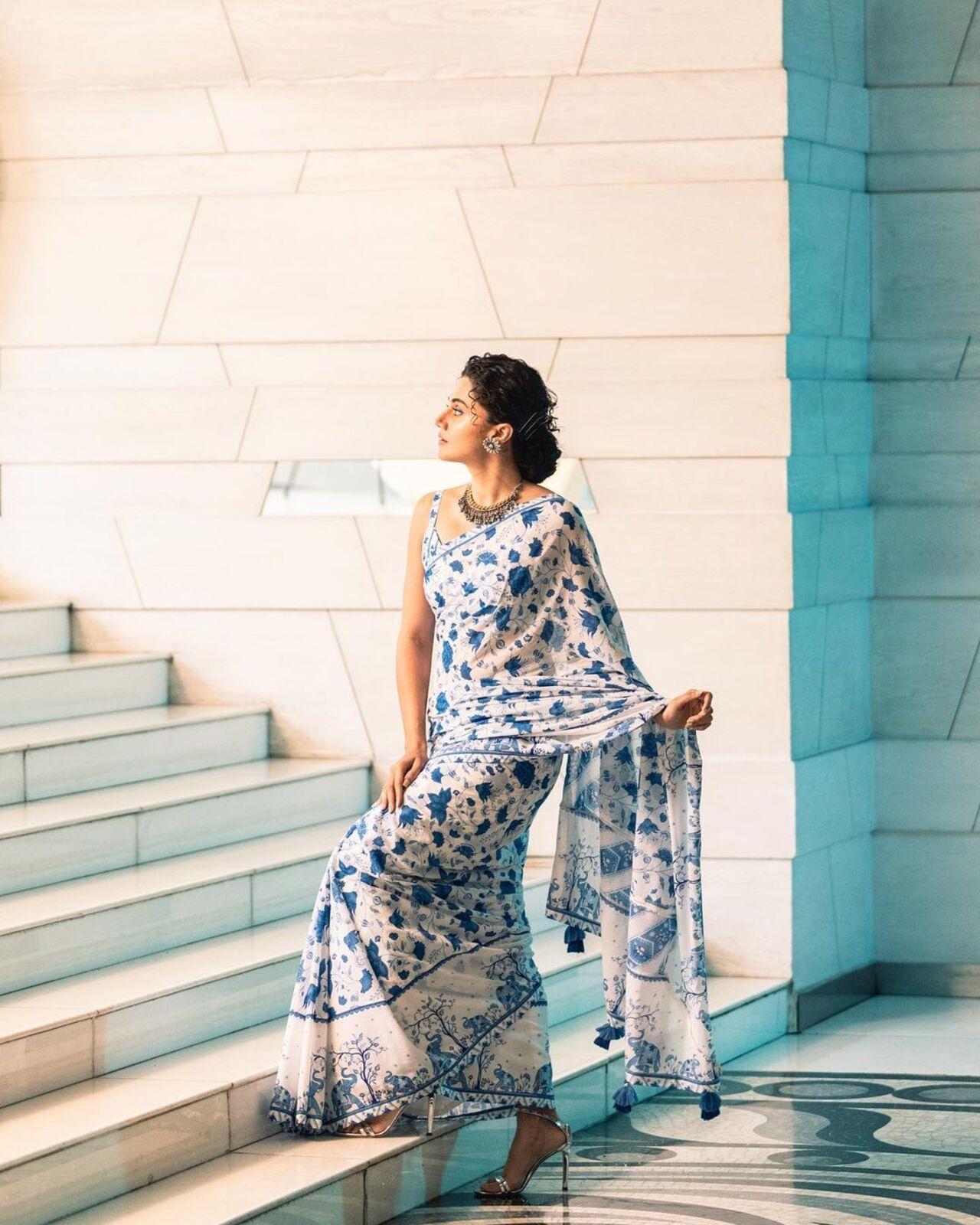 It seems like Taapsee has a soft spot for white as she frequently wears printed sarees with white as the base colour