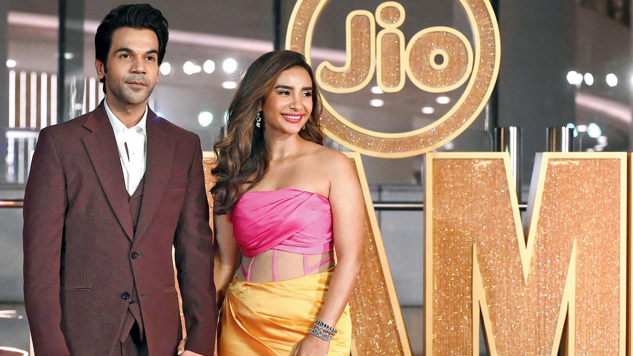 Bollywood actors Rajkummar Rao and Patralekha pose upon their arrival for the opening ceremony of ‘Jio MAMI Mumbai Film Festival 2023’ in Mumbai on October 27. Pic/Getty Images