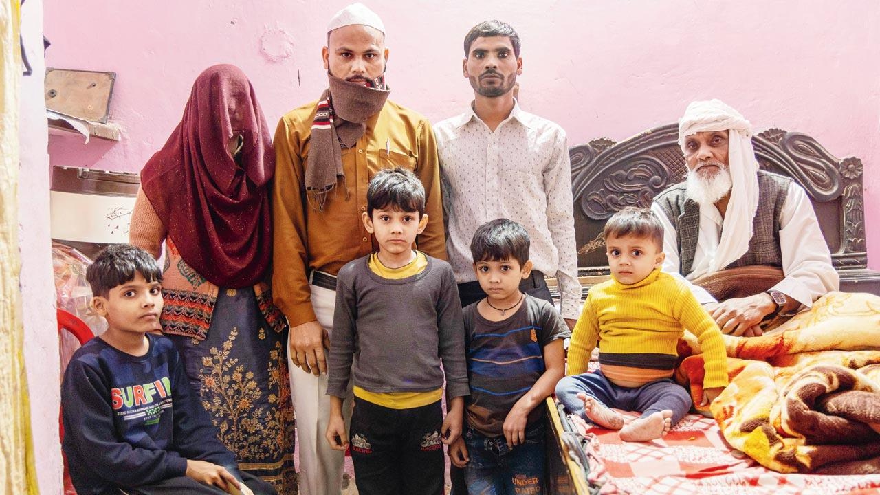 Munna Qureshi with his family at their home where he and many of the other Silkyara heroes live. Khajoori Khas lies in the North East District of Delhi. 