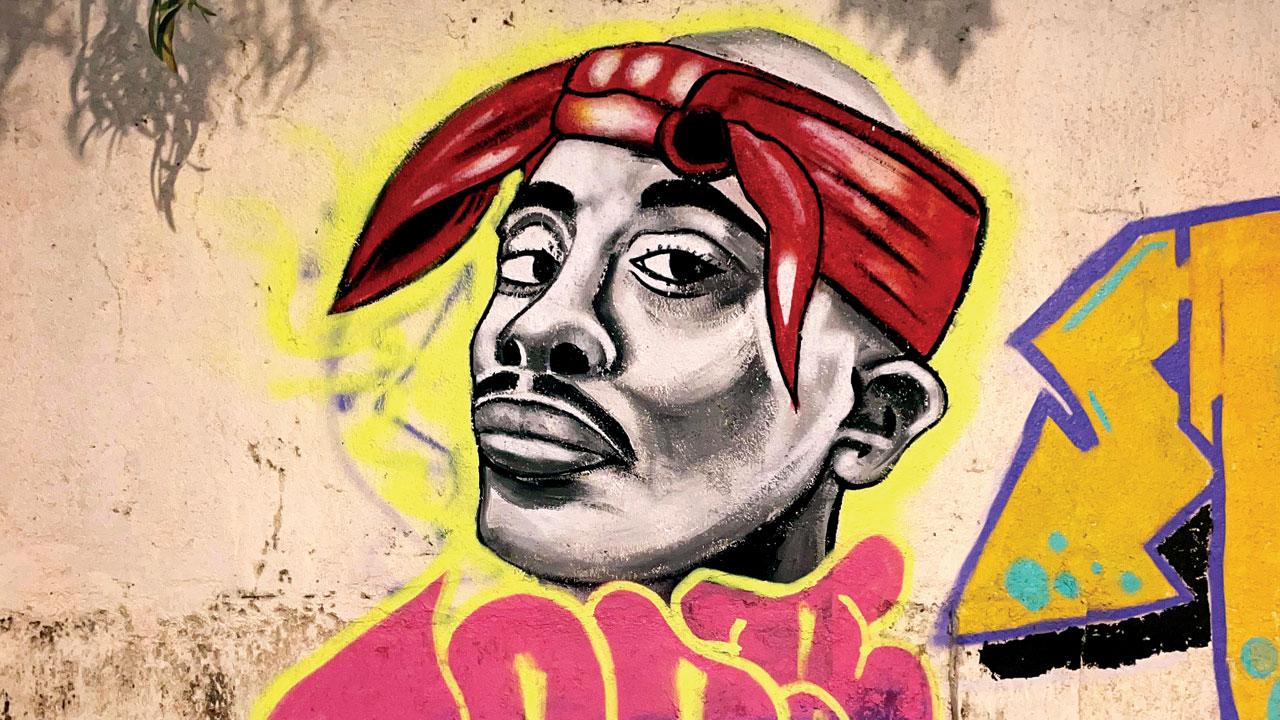 The graffiti at the Marol Art Village with  the artist’s signature