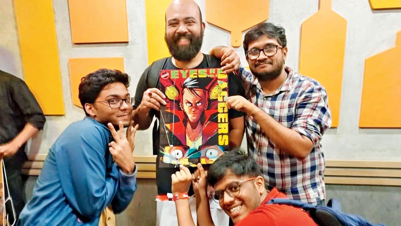 (Clockwise) Vivek Nag, Vignesh Ramesh, Prathamesh Gandhi and Bajro Narayan Dutta with the book