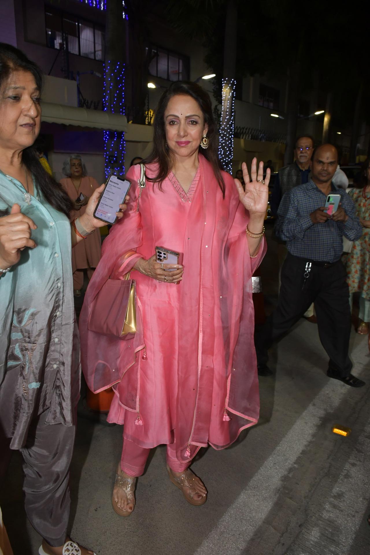 Hema Malini was seen at the function in a rose pink salwar kameez