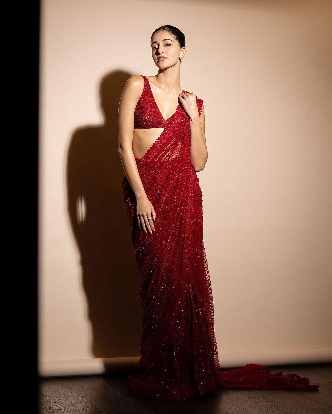 Ananya Panday is currently winning hearts for her portrayal of Ahana in Zoya Akhtar's latest 'Kho Gaye Hum Kahan'. Her stylist Tanya Ghavri dropped these pictures of Ananya in this show-stopping red saree 