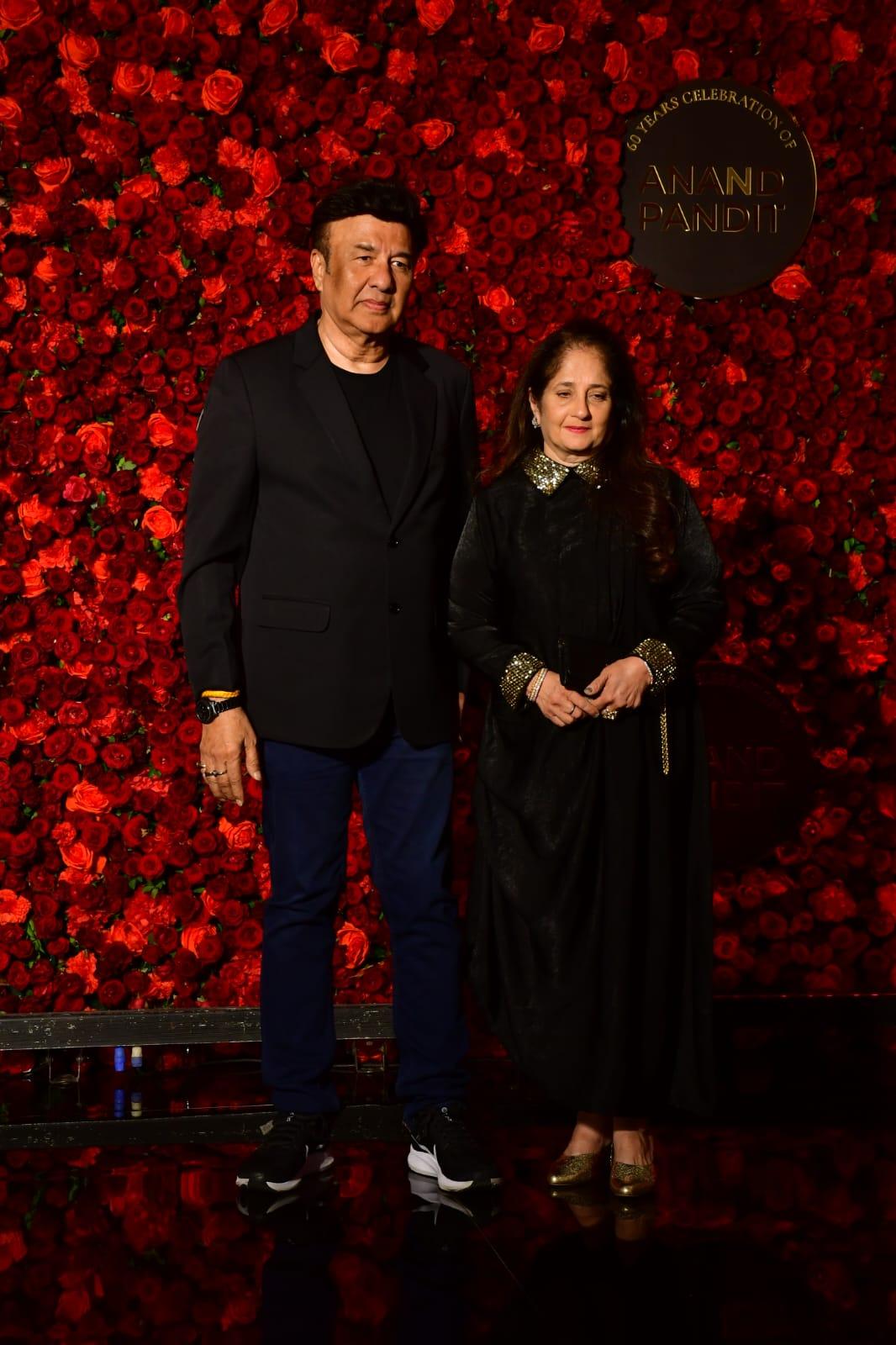 Anu Malik posed for the cameras with his doting wife Anju Anu Malik. The couple looked happy to be able to celebrate Anand Pandit