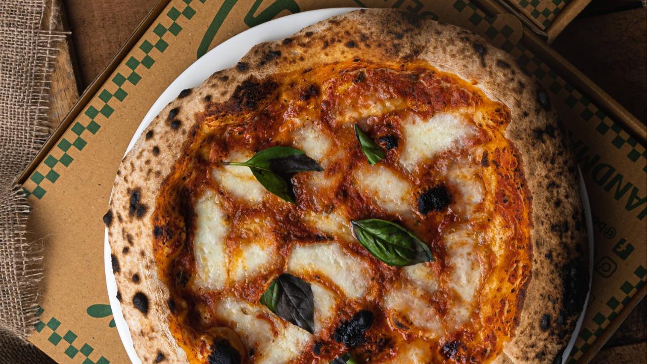 The menu presents popular pizzas with familiar traditional toppings, often with tweaks, such as a Peri Peri Margherita or one with Burrata! Their most ordered pizza, however, is their custom option that allows the customer to create a pizza using toppings of their choice. Image Courtesy: Baking Bad