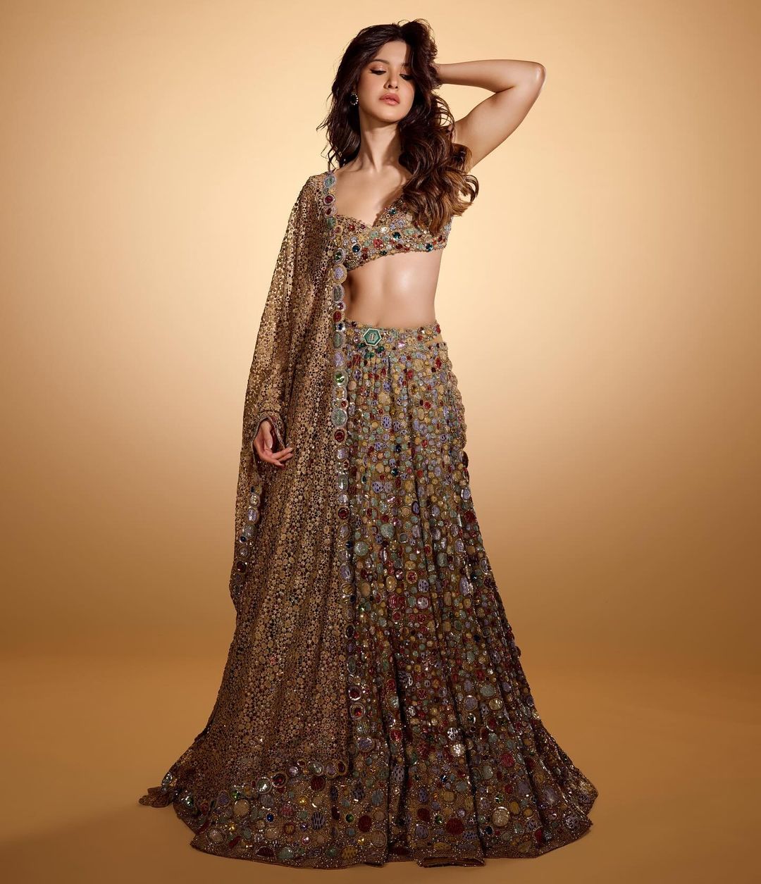 Shanaya Kapoor continues to set fashion standards with her mesmerizing lehenga look. The heavily embroidered lehenga is an ideal choice for stealing the spotlight and making a statement as the perfect bridesmaid