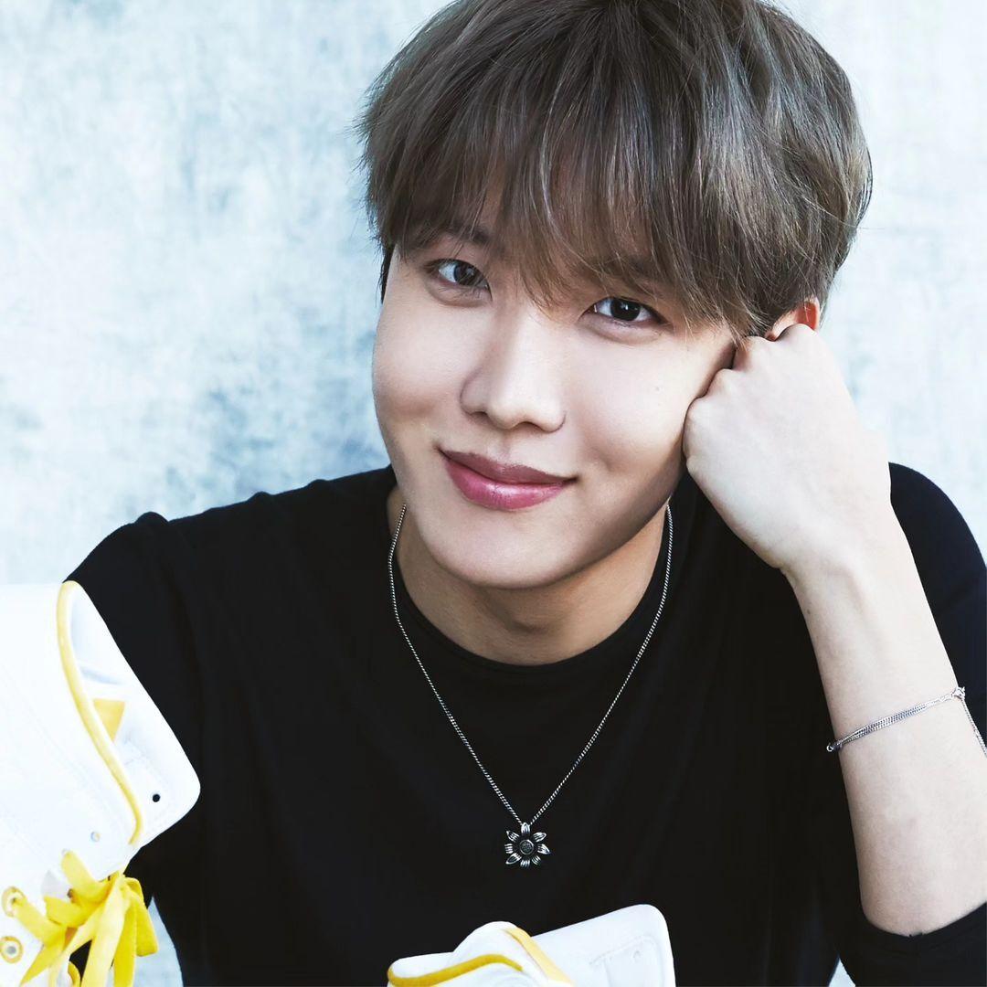 The photobook also captures the band members' enthusiasm and hardships concerning their music and spectacles. Seen here is the band's lead dancer J-hope