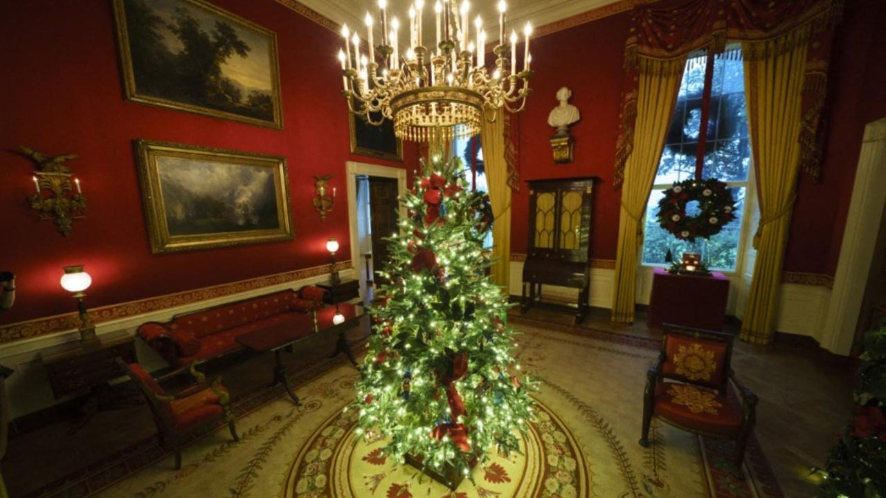 A Christmas tree and decorations are on display in the Red Room of the White House (Pic credits/AFP)