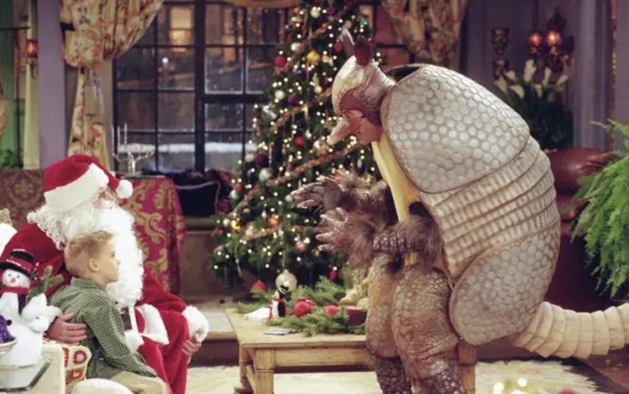 'The One With the Holiday Armadillo' from Friends (Season 7, episode 10)
Ross unexpectedly finds himself looking after Ben, and decides to do something special for Christmas. Since all the Santa costumes have been rented out, Ross dons the best outfit left and entertains Ben as the holiday armadillo
