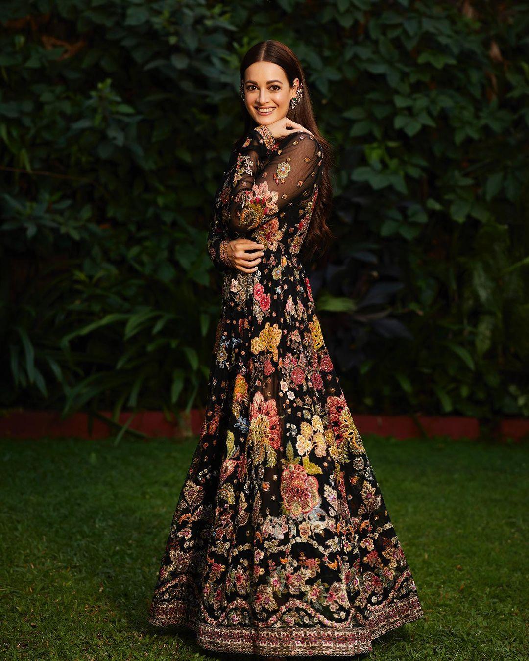 Floral fun: Dia Mirza celebrated the spectacular opening of the NMACC earlier this year in this handcrafted Ritu Kumar outfit. Ritu Kumar is one of the first Indian wear brands and this wildflower dress is an ode to the world of finest Indian craftsmanship.