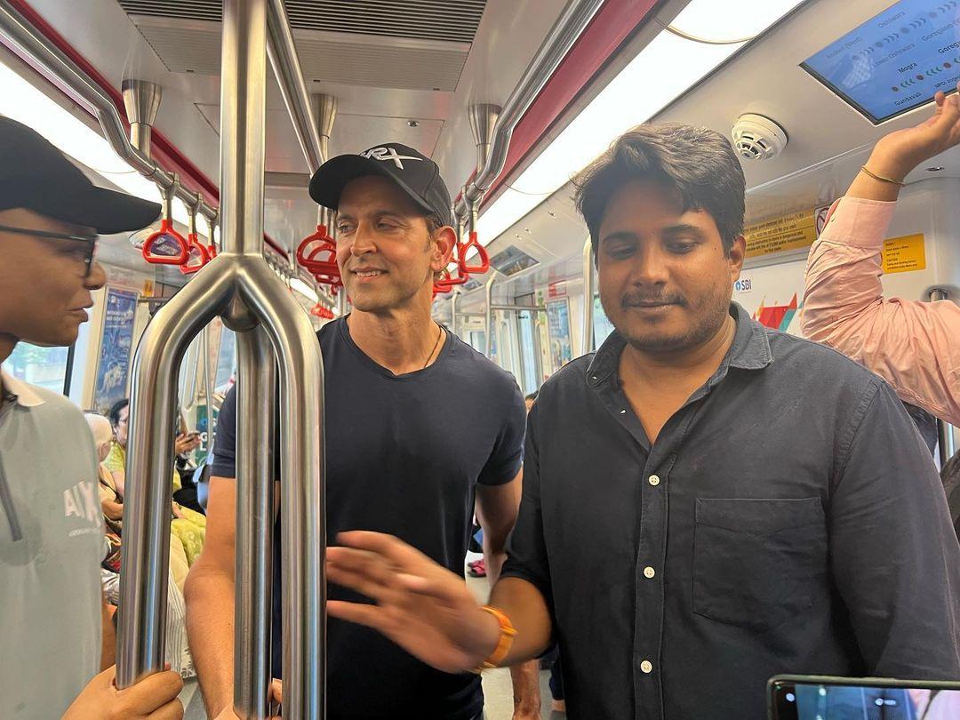 The internet was pleasantly surprised as Hrithik Roshan shared pictures & videos from his Metro ride. Hrithik was seen casually riding in the metro and interacting with fellow passengers as he decided to beat the heat and traffic by taking the Mumbai Metro.