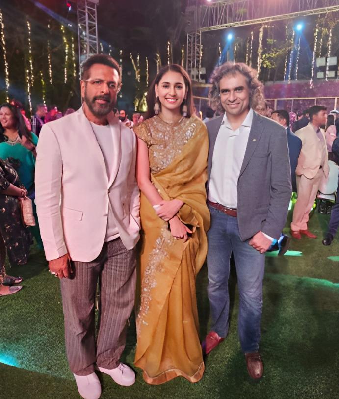 Hasleen Kaur posed with Imtiaz Ali and Javed Jafferi at the grand reception
