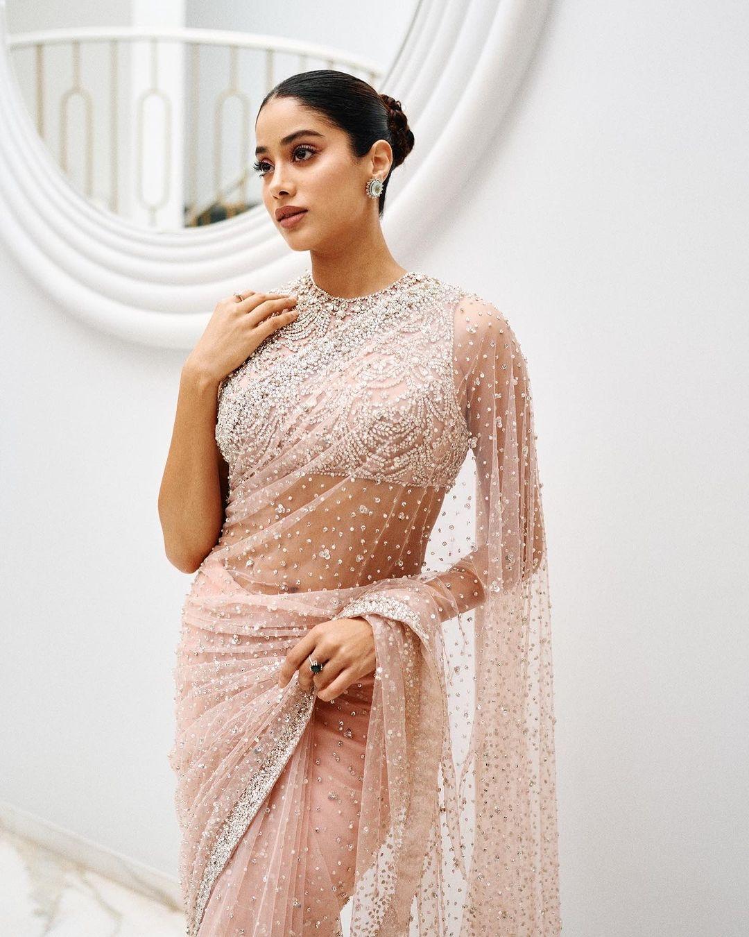 Going back to her roots, Janhvi Kapoor also gave us this beautiful baby pink saree moment. We can't decide what we love more, the latex or Janhvi in a saree!