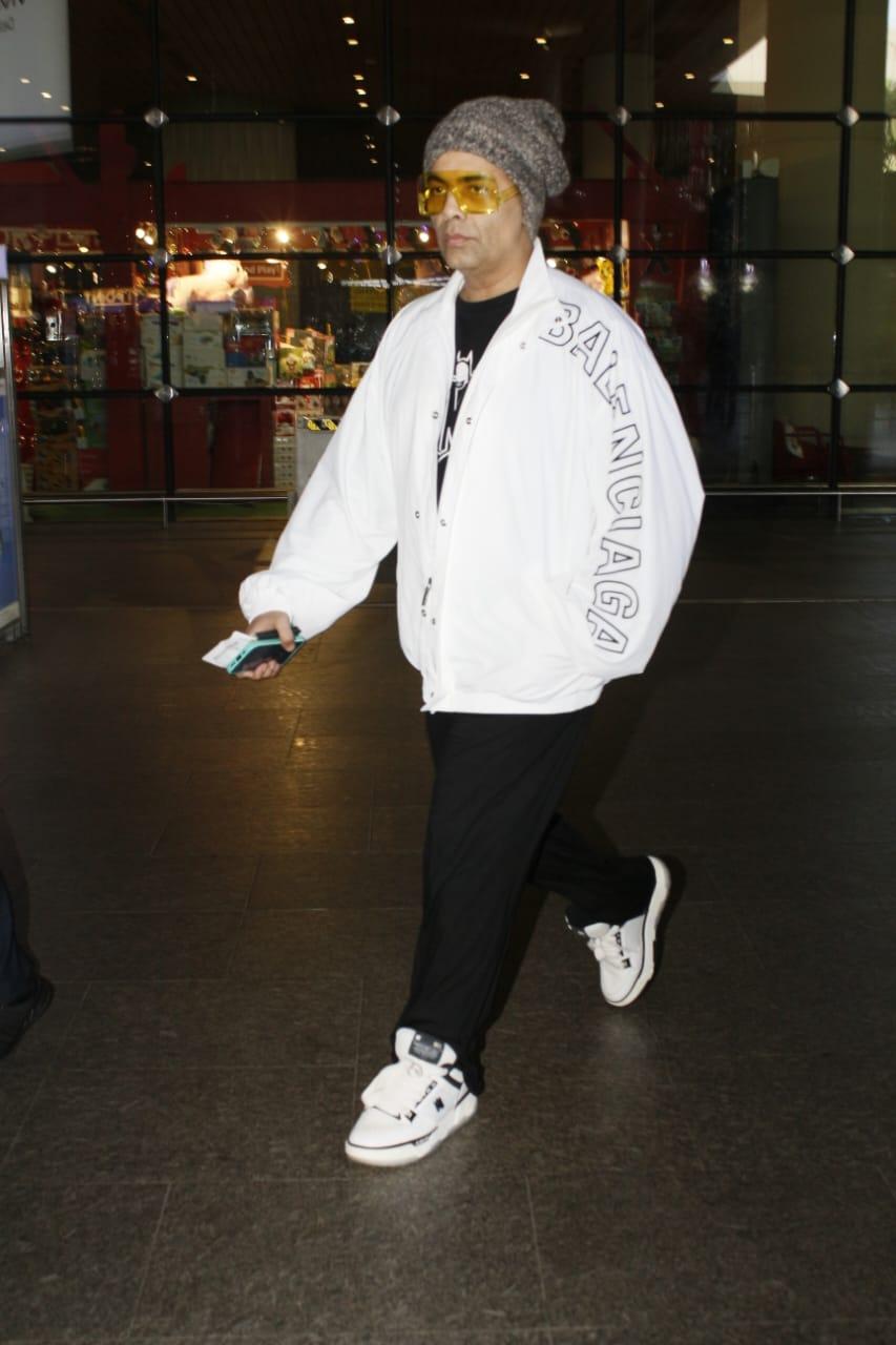 Karan Johar was spotted sporting a stylish avatar as he was clicked at the airport