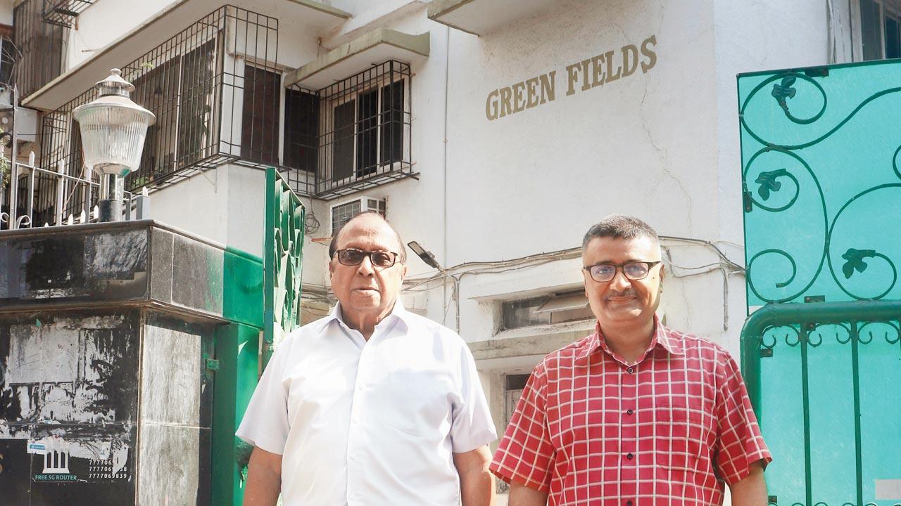 Rodney D’Mello and Dion D’Mello at the gate of Green Fields on Sherly Rajan Road. Pic/Anurag Ahire