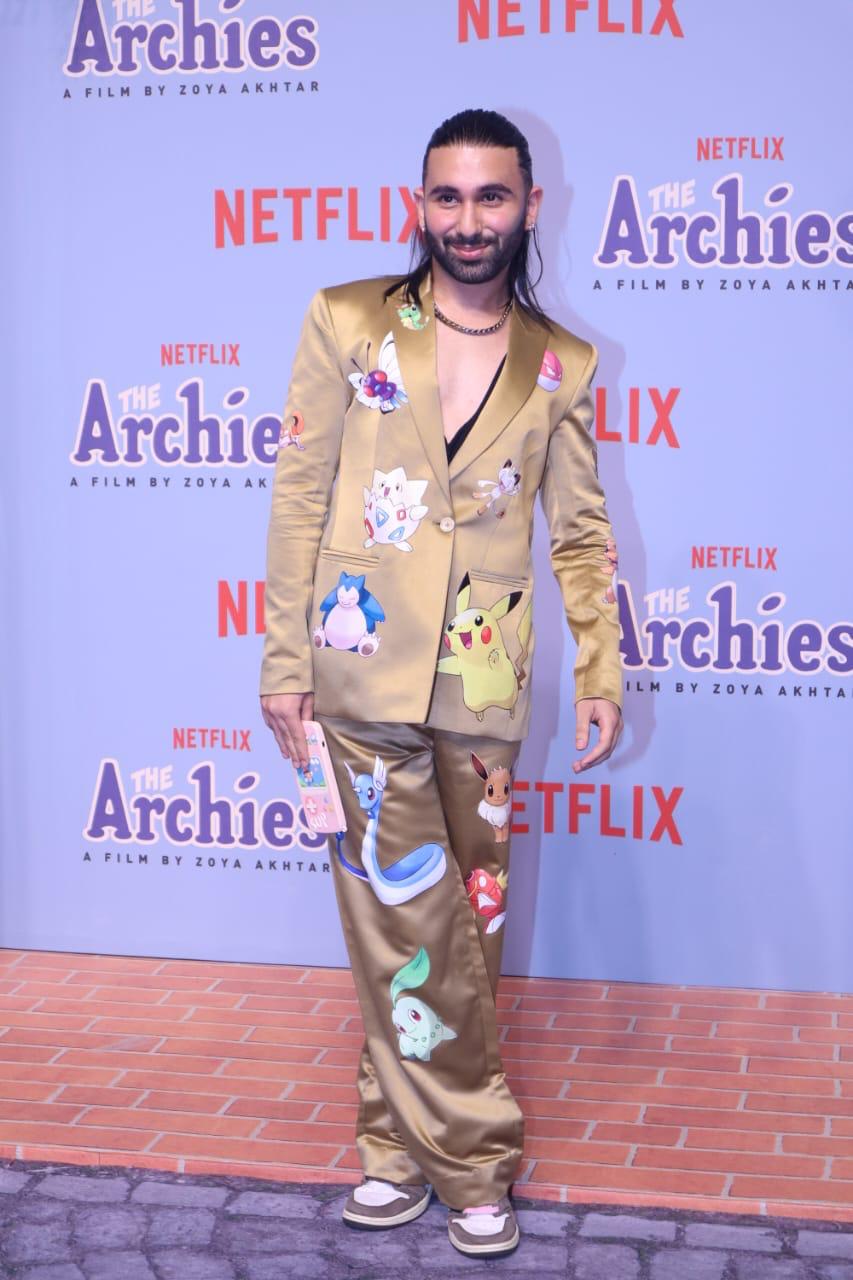 Orry joined the stars on the red carpet looking like a million bucks in this golden sleek suit which had on a quirky print