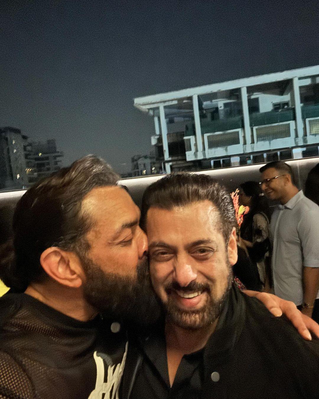 Bobby Deol affectionately pecked Salman Khan on the cheek 