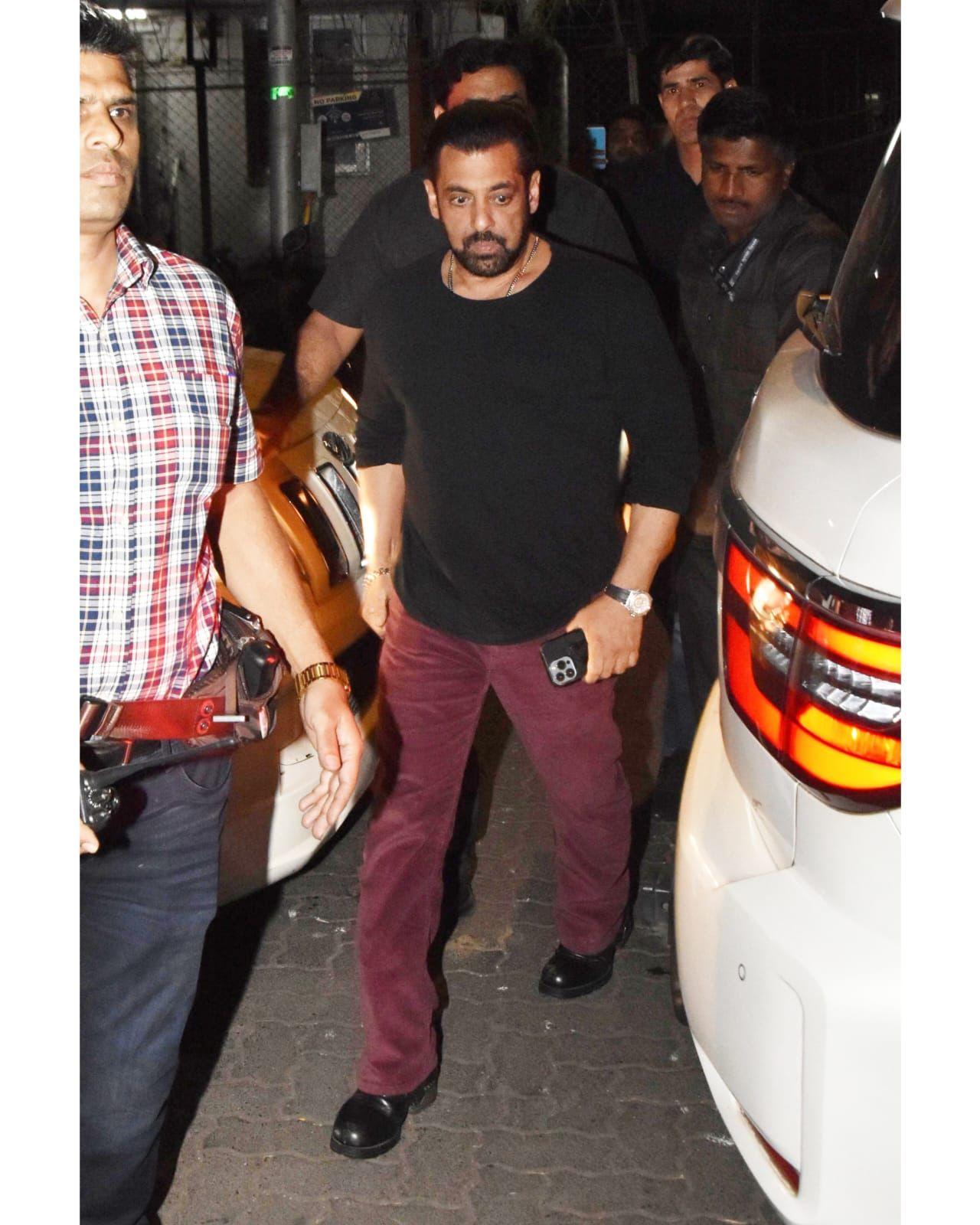 The actor was dressed in purple jeans which he paired with a black shirt