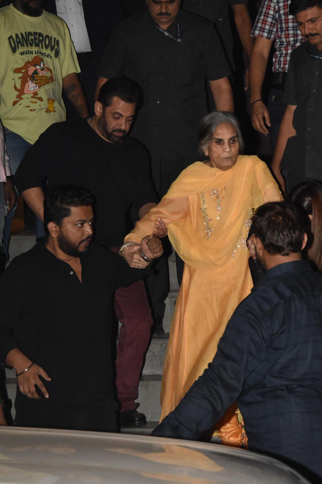 Salman Khan helped his mother Salma as they left the party