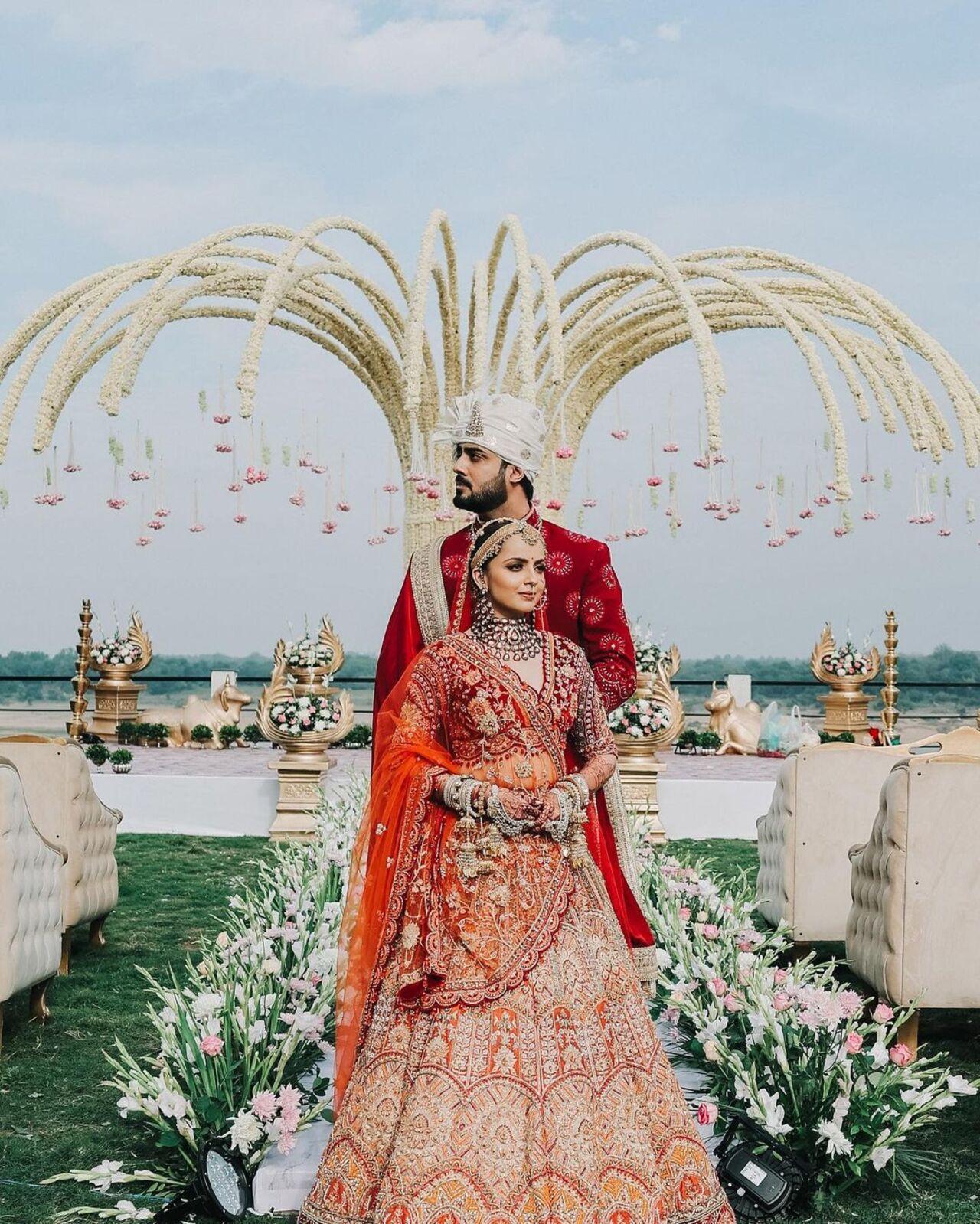 Akshay Mhatre was dressed in a red sherwani to complement his beautiful wife. The couple looked all shades of happy in the pictures from their grand wedding